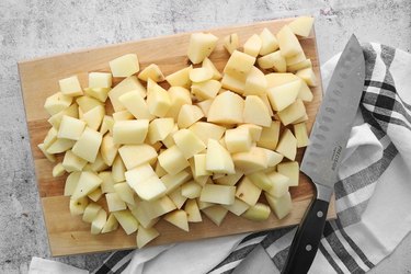 Peel and chop potatoes