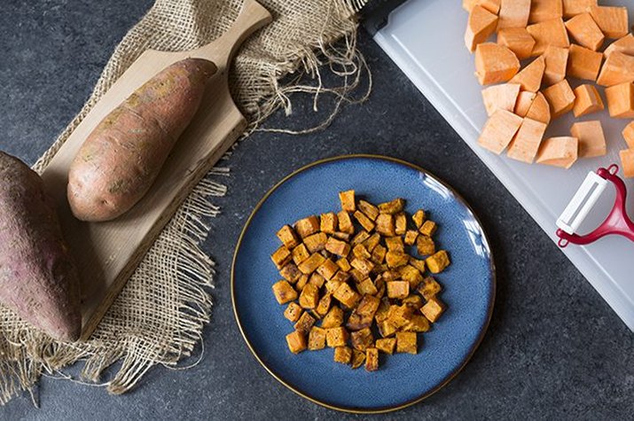 Sweet potatoes in various stages of preparation