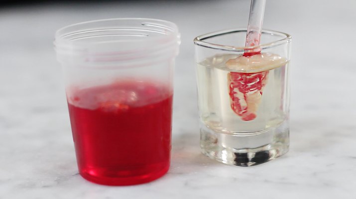 Dispensing grenadine into gelatin