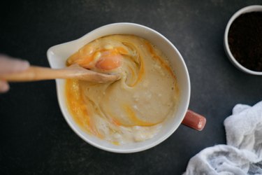 Stir in the eggs, milk and vanilla until evenly combined.