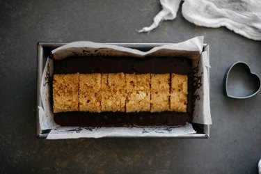 Stand the cake hearts up in a tightly compacted row.