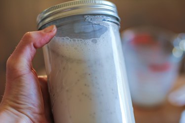 Shaking the jar of chia seed pudding ingredients