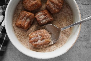 Toss churros in cinnamon sugar