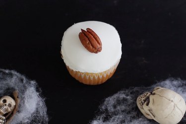 Pecan halve on top of fondant