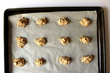 Space teaspoon-sized cookie dough onto parchment paper