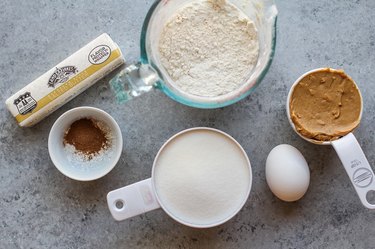 measuring cups of ingredients for cookies