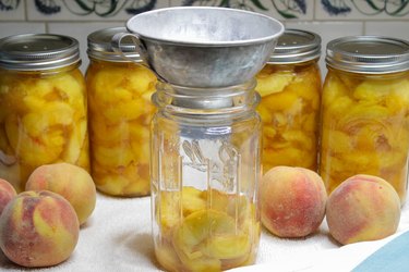 Even though fresh peaches are only available for a few months in the summer, there\'s no reason you can\'t enjoy them all year long. Just choose some fresh ripe peaches, grab a few jars, a little sugar, and you\'ll be on your way to preserving these delightful beauties in no time.