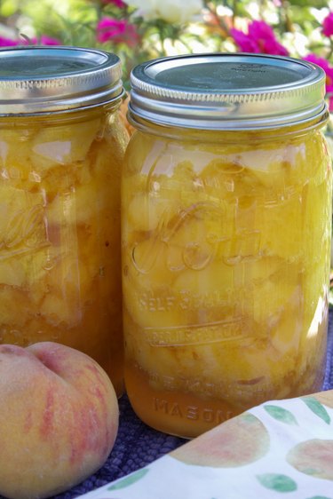 Even though fresh peaches are only available for a few months in the summer, there\'s no reason you can\'t enjoy them all year long. Just choose some fresh ripe peaches, grab a few jars, a little sugar, and you\'ll be on your way to preserving these delightful beauties in no time.