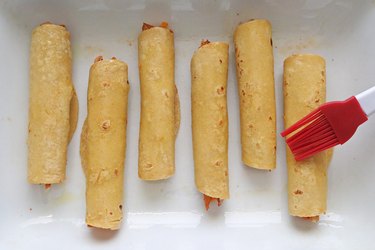 Brush taquitos with oil