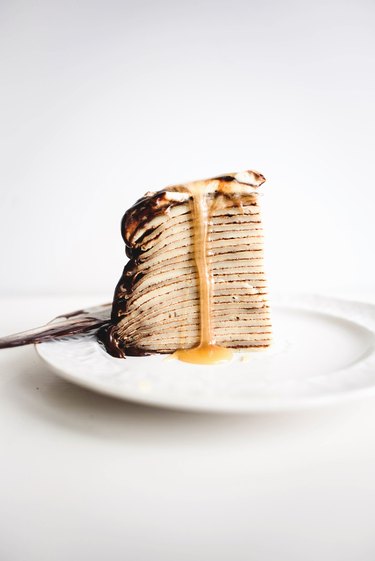 Slice and enjoy your Dark Chocolate and Caramel Crepe Cake.