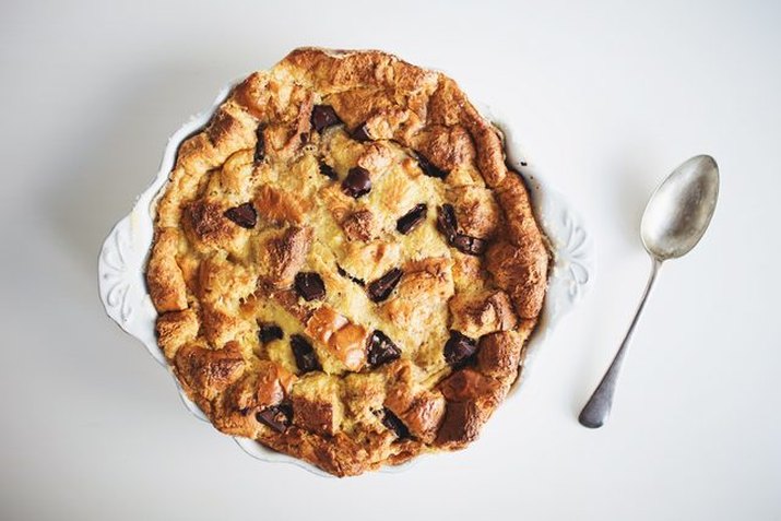 A dish of freshly baked cinnamon bread pudding.