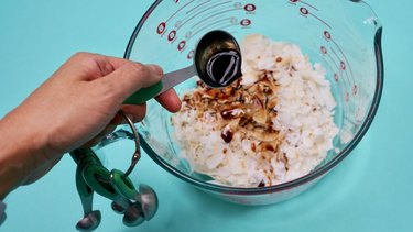 Flavoring coconut chips to make vegan coconut bacon.