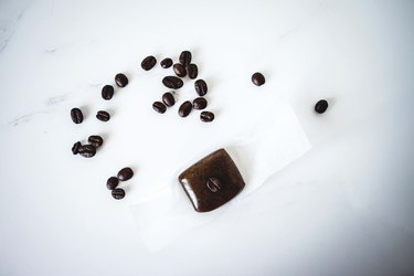 Coffee caramel on a piece of waxed parchment.