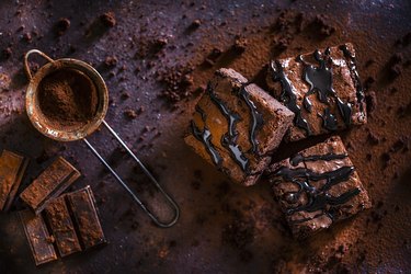 Chocolate brownies on dark brown table