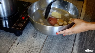 Blanching potatoes for freezing.