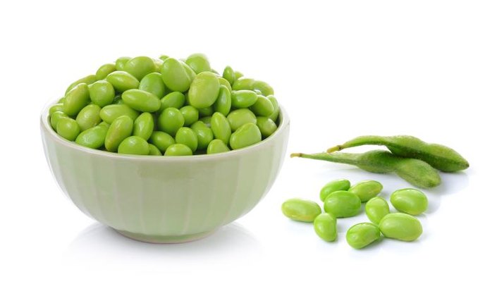 Edamame soy beans in  bowls on white background