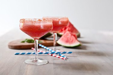 Freshly blended watermelon mint beer coolers served in margarita glasses.