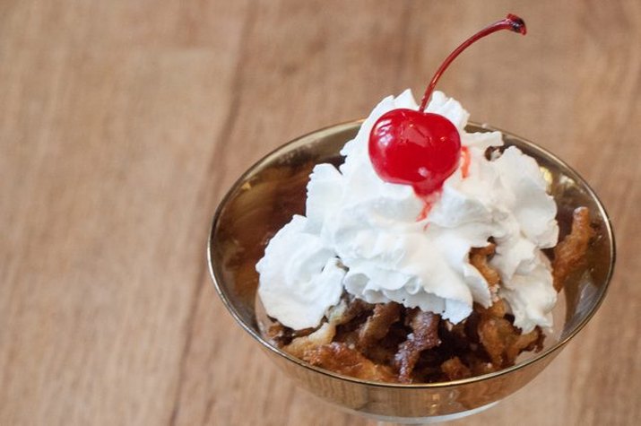 Deep-fried Coke topped with whipped cream and a cherry.