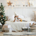 Cozy,Little,Sisters,Are,Hugging,On,The,Bed,In,White